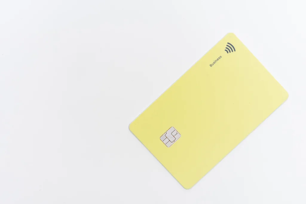 yellow square card on white surface